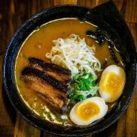 Tonkotsu Soy Ramen · The original smooth and rich pork based soup with thin noodle, topped with pork belly chashu...