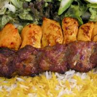 Kabob Koobideh & Chicken Kabob With Basmati Rice · One skewer of juicy strips of charbroiled, seasoned ground beef and marinated boneless chick...