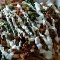 Super Steak Fries · TOP SELLER FOR A REASON. Loaded with our crinkle cut fries, lettuce tomatoes, onions, avocad...