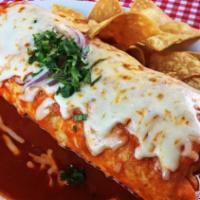 Wet Burrito · Wet burrito ( choice of meat ) cover on green salsa and cheese.