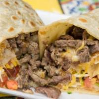 California Burrito · Burrito with fries(meat of your choice) onion, cilantro, tomatoes and cheese.