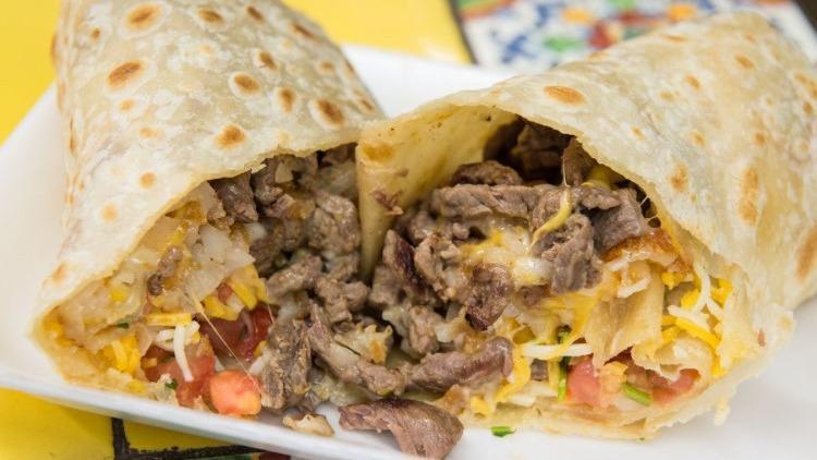 California Burrito · Burrito with fries(meat of your choice) onion, cilantro, tomatoes and cheese.
