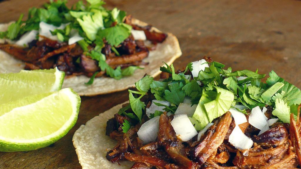 Tacos · Tacos with your (choice of meat) onions, cilantro, and cabbage.