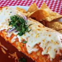 Wet Burrito · Covered in green salsa and cheese.