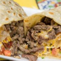 California Burrito · Seasoned fries, cheese, onions, cilantro, tomato, crema choice of meat.