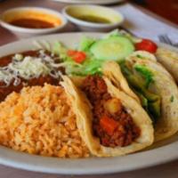 3 Tacos Combo · Three tacos with rice and beans, cabbage, onion and cilantro.