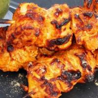 Tandoori Chicken Tikka · Spicy chicken char grilled in the tandoor grill.