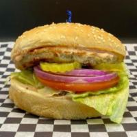 Turkey Burger · Turkey patty with 1000 island dressing, lettuce, tomato, pickle, and onion.
