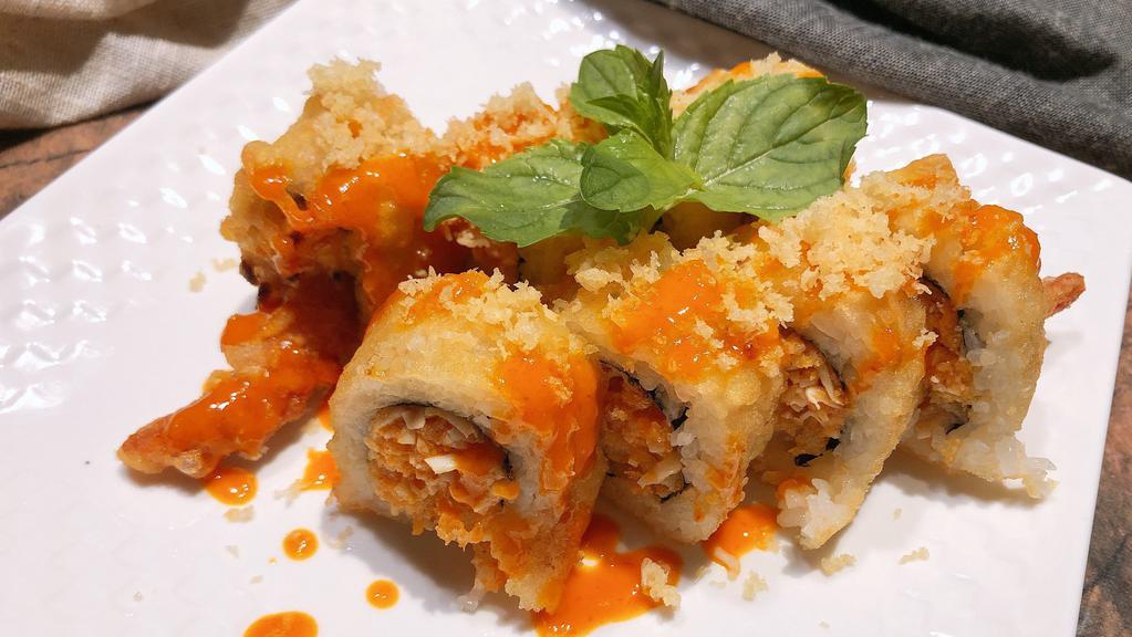 Tiger Tempura Roll · Temura Shrimp and spicy tuna. Avocado inside. Deep-Fried out side crunch on top. spicy mayo and  eel sauce
