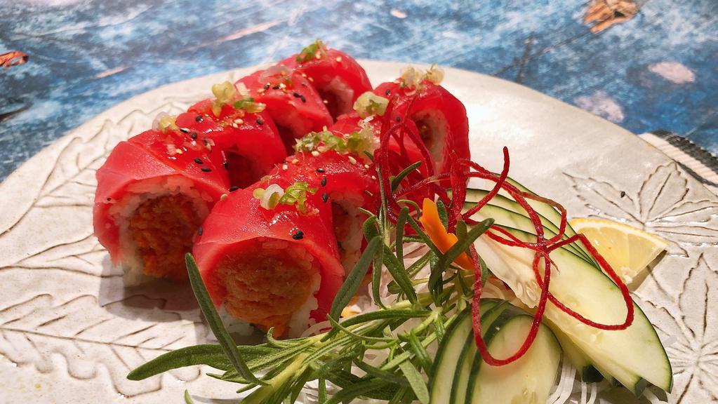 Hawaiian Roll · Spicy. spicy Tuna. green onion, and house special sauce . fresh tuna on top. chili oil.