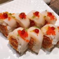 Hurricane Roll · Spicy. Spicy tuna inside wrapped in soy paper with white tuna, red onion, and masago. Chili ...