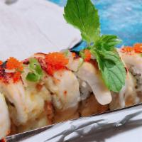 Snow Roll · Spicy. Baked crab. Avocado. Cream Cheese & White Fish topped with Masago & Green Onion