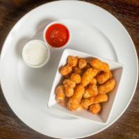 Parmesan Cheese Curds · Enjoy lightly breaded and deeply fried cheese curds served with marinara sauce.