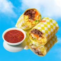 Ultimate Breakfast Burrito · Eggs, carne asada, bacon, tater tots, melted cheese, caramelized onions, avocado.