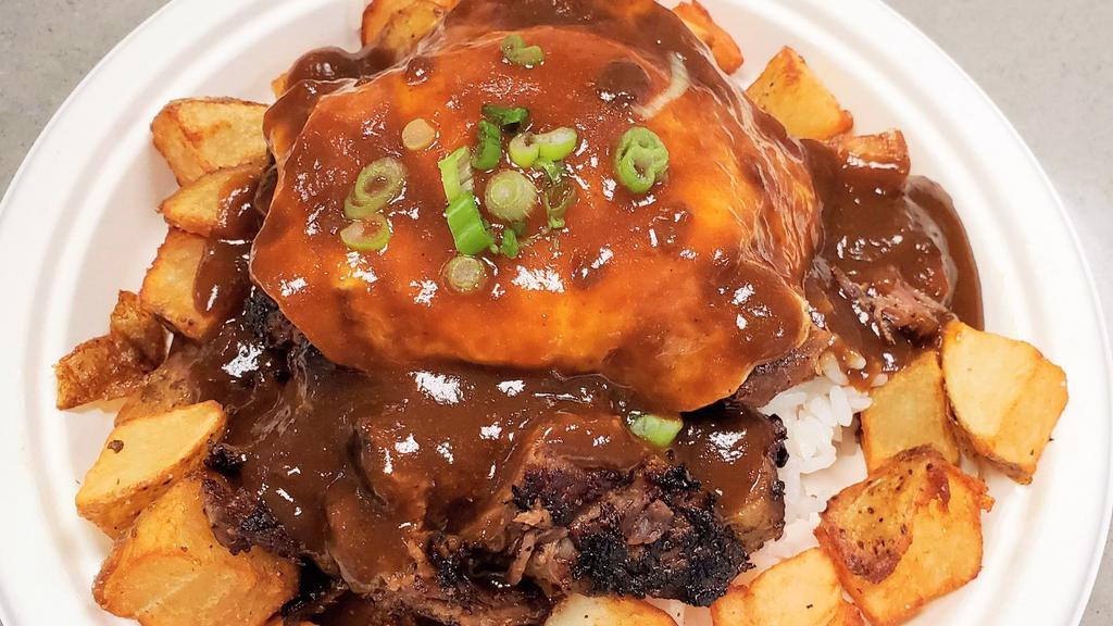 Braised Beef Loco Moco · Tender braised beef, lightly seared with a crust.  Served with egg, brown gravy, rice.
