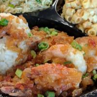 North Shore Shrimp Plate Lunch · 6-7 extra jumbo white shrimp, sauteed in a Hawaiian-style garlic butter sauce. Includes rice...