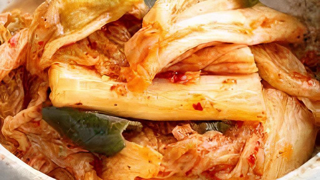 Kimchee Side · Korean spicy pickled cabbage.