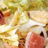Shaved Citrus Coleslaw · Thinly shaved cabbage mix, with ginger-citrus dressing.