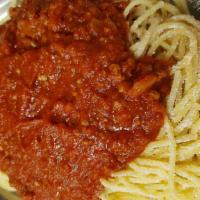 Greek Style Spaghetti · Our own homemade meat sauce made with fresh ingredients and topped with mizithra. Served wit...