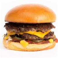 (Um) The Deluxe Burger · Smashed Double Patties, Dashi Onions, American Cheese, Pickle Chips, Mustard, Ketchup on a S...
