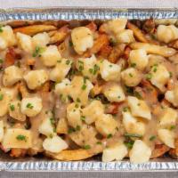 Classic · Hand-cut fries (8 oz), wisconsin white cheddar cheese curds (3 oz), homemade brown gravy (6 ...