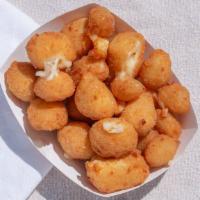 Fried Curds · Breaded wisconsin cheddar cheese curds.
