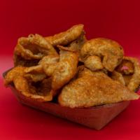 Spicy Fried Chicken Skins · Fried chicken skins dusted with a trio of spices.