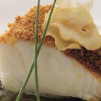 Chilean Sea Bass With Dry Miso · Sea bass steamed with yuzu juice, olive oil, and sake, topped with dry miso seasoning.