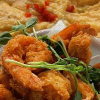 Shrimp (Fried Or Sautéed) & Grits · 12 pieces Cea-Lo's signature golden fried shrimp served with creamy stone-ground grits. Grit...