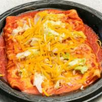 Cheese Enchiladas · With sauce, lettuce, and cheese. Served with rice and beans.