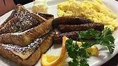 French Toast Combo · Two eggs and old-fashioned french toast with your choice of three applewood smoked bacon strips or three sausage links.