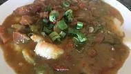 Shrimp And Grits · Shrimp, andouille sausage, bacon, onions and red and green bell peppers, spicy full of flavo...