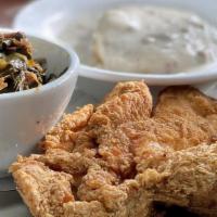 Southern Fried Chicken Plate · A breast of chicken dipped in buttermilk, breaded and deep-fried and served with a biscuit a...