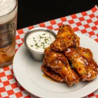 Chicken Wings · Spicy buffalo, honey garlic, or bbq. Served with ranch or Bleu cheese.