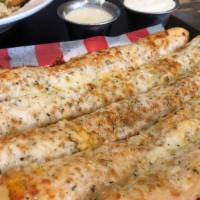 Bread Sticks · House dough brushed with garlic oil and covered with melted cheese. Served with house white ...