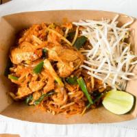 Pad Thai · Thin rice noodle stir fried with sweet tamarind sauce, peanuts, bean sprouts, and green onio...