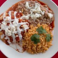 Mama'S Queso Fresco · Topped with our Mexican crumbled queso fresco, enchilada sauce, and Mexican sour cream. Thre...