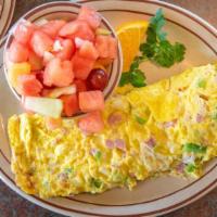 Denver Omelette · A blending of diced ham, bell peppers and onions.