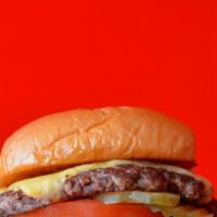 Smash Cheeseburger · Smash Burger patty with smash sauce, American cheese, shredded lettuce, tomato, onion and pi...