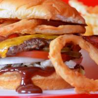Bbq Bacon Cheeseburger · Smash Burger patty with bbq sauce, cheddar cheese, smoked bacon, crispy onion rings, shredde...