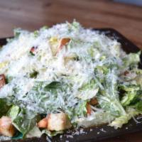 Caesar Salad · Romaine Hearts, Sourdough Croutons, Shaved Parmesan, Caesar Dressing.