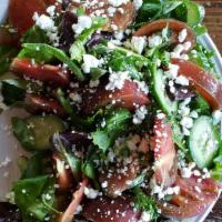 Seasonal Salad · Mixed greens, heirloom tomatoes, cucumbers, feta, balsamic dressing