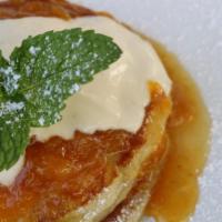 Buttermilk Pancake · buttermilk pancake, peach bourbon, sour cream yogurt, maple butter, maple syrup.