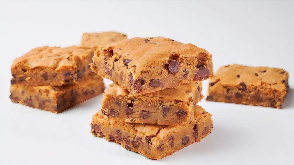 Blondie · Scrumptious Pecans, Walnuts and Semi Sweet Chocolate Chips are Blended Into Our Blondie Brownie Batter.