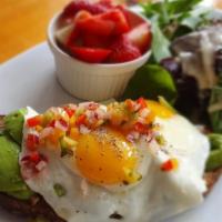 Avocado Toast · Made with wheat toast topped with avocado pure, fresh avocado, salsa, eggs, fruit and baby g...