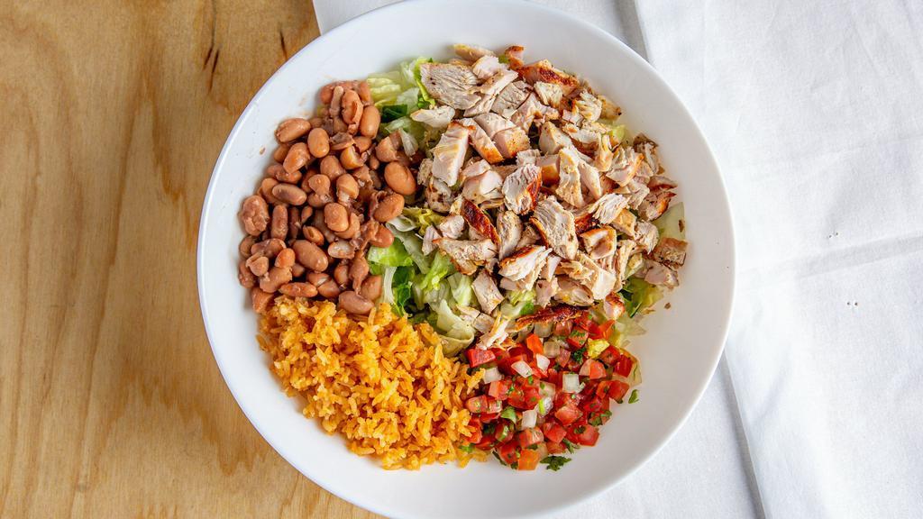 Chicken Bowl · Rice, pinto beans, spring mix bed, pico de gallo, salsa, guacamole.