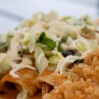 Chicken Enchiladas Plate · Refried beans, rice, 3 chicken enchiladas, lettuce, queso fresco, and sour cream.