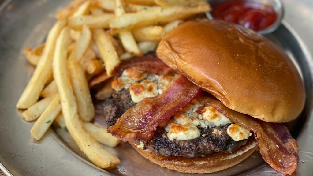 Black & Blue Burger · Blue cheese crumbles, caramelized onions, smoked bacon, and garlic aioli