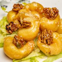 Honey Walnut Shrimp · Crispy shrimp over lettuce glazed with honey walnut sauce, topped with walnut.
