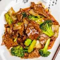 Beef With Broccoli · Tender slice beef with broccoli, carrots and onion stir-fried in brown sauce.